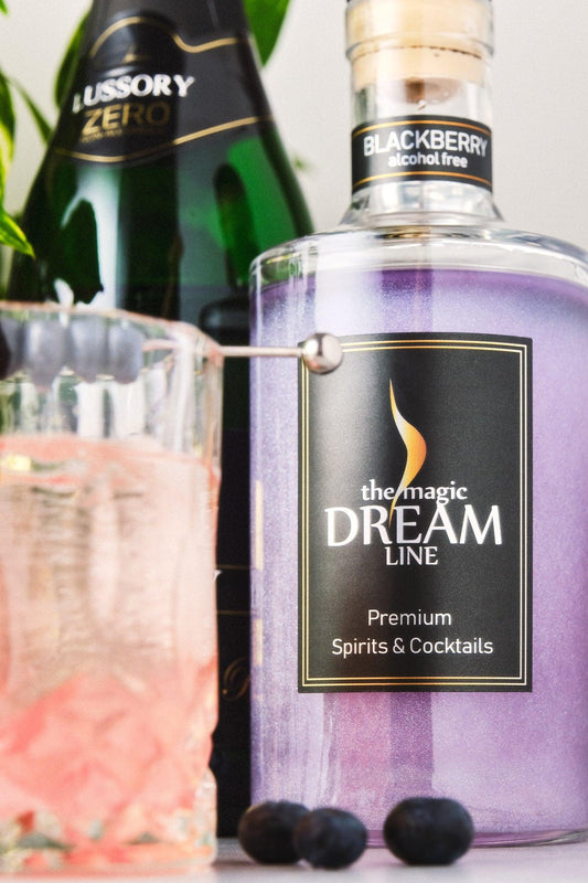 Lussory Sparkling Wine next to Dream Line's Blackberry, blueberries and a beverage made with both