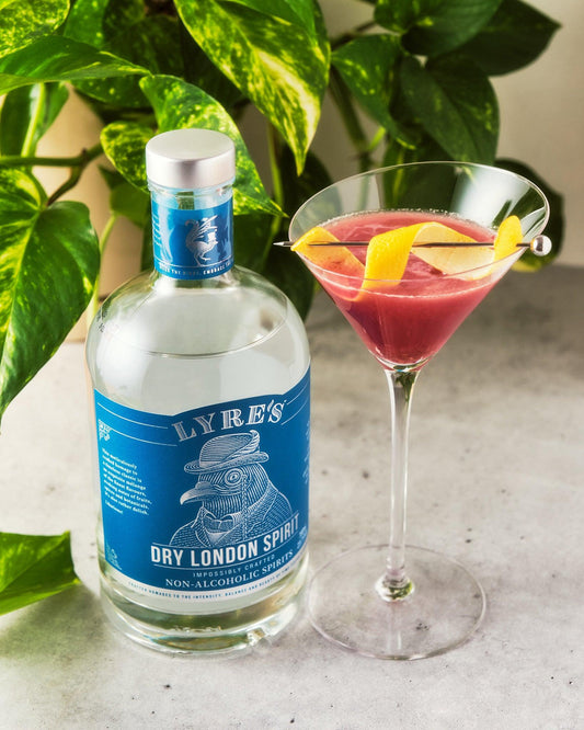 Lyre's Non-Alcoholic Dry London Spirit next to Raspberry Lemon Gimlet Mocktail